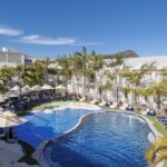 Daylight view over the outdoor pool at Ramada Resort by Wyndham Shoal Bay, NSW