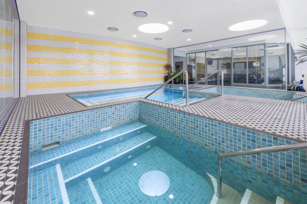 Tiled indoor pool at Ramada Resort by Wyndham Shoal Bay, NSW