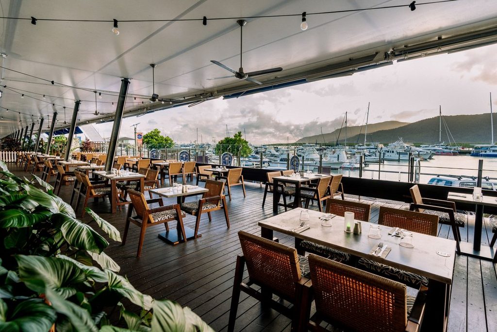 Outdoor marina-side dining at Shangri-La The Marina, Cairns
