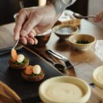 Chef plating dish at Magill Estate Restaurant, South Australia | Luxury Escapes.