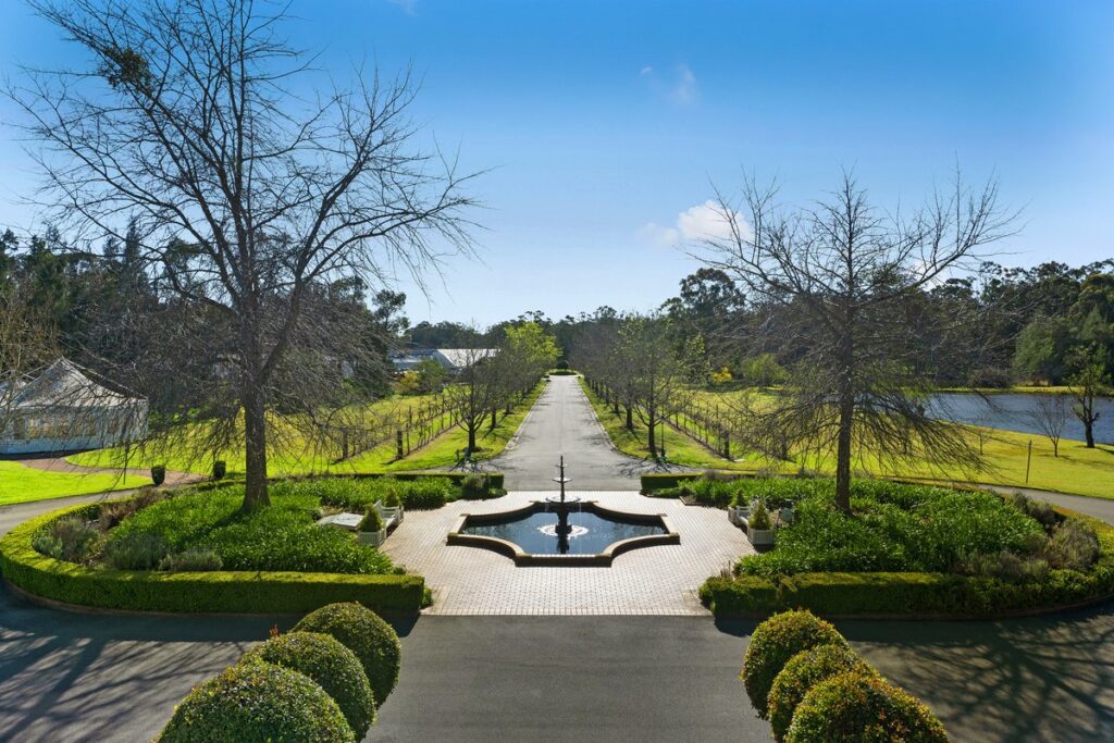 - Fountain and tree-lined driveway at The Convent Hunter Valley, Pokolbin