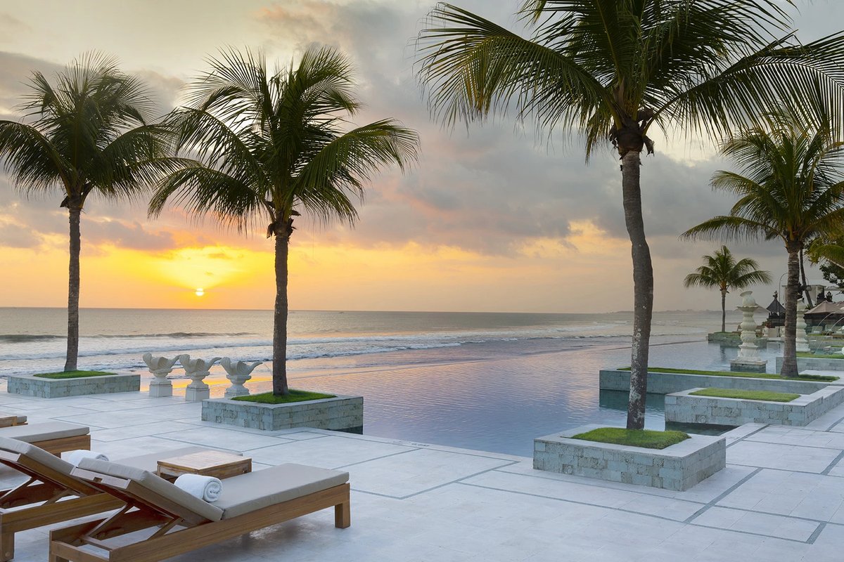 Infinity pool at sunset at The Seminyak Beach Resort & Spa, Bali